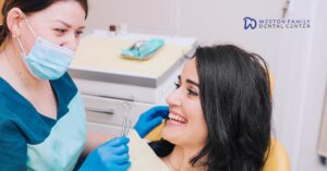 dentist checking implant patient at Weston, FL